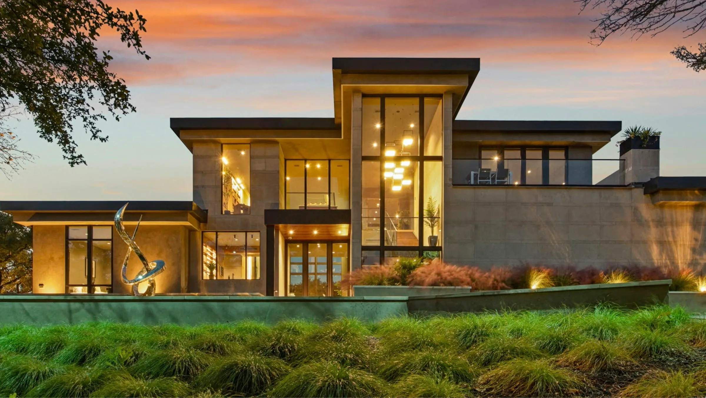 Modern luxury home with smart lighting at dusk